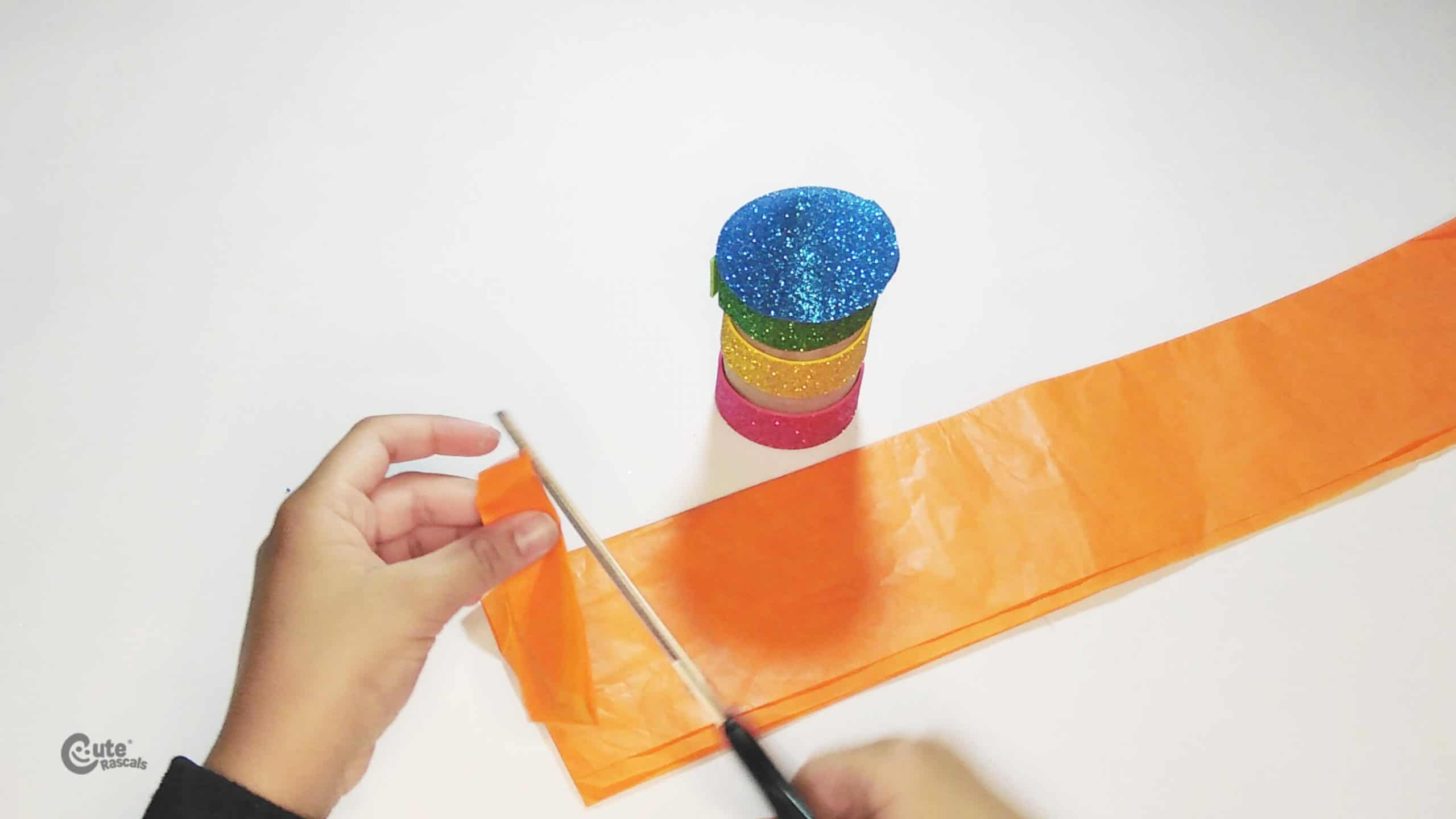 Make some strips with the tissue paper
