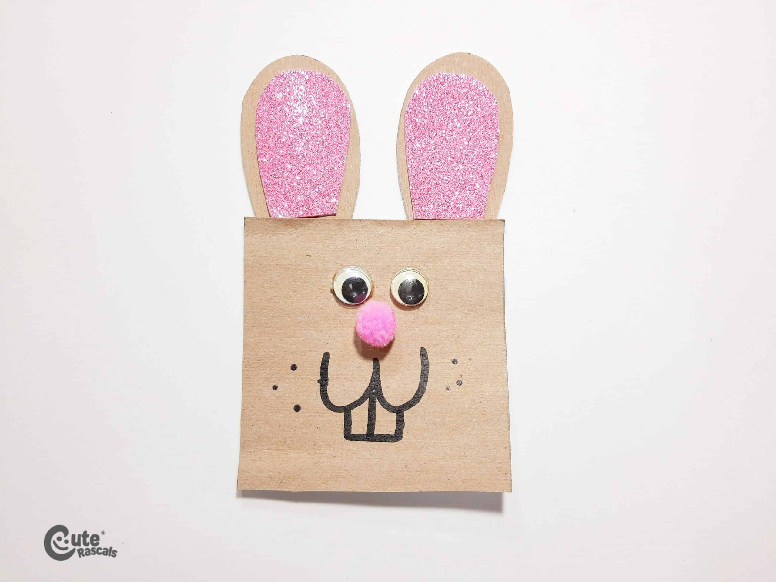 Easter bunny crafts for kids. A simple paper bag rabbit handcraft