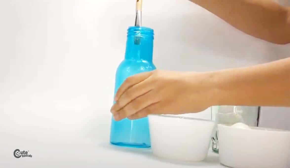 Put oil into the bottle's opening. Easter science experiments