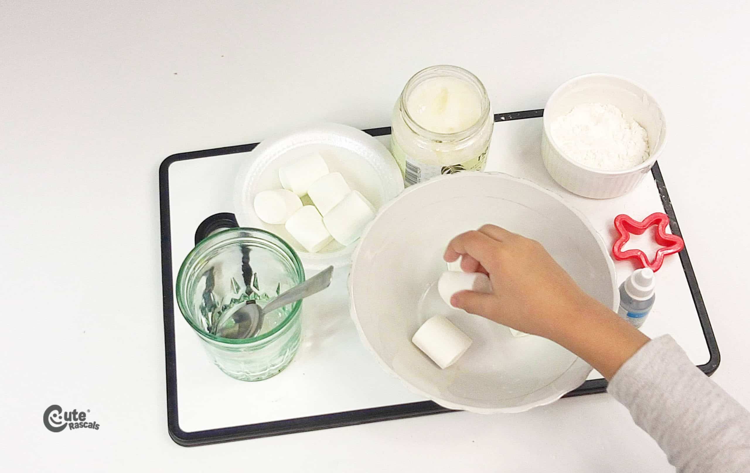 Put the marshmallows in the container. Fun edible playdough recipe