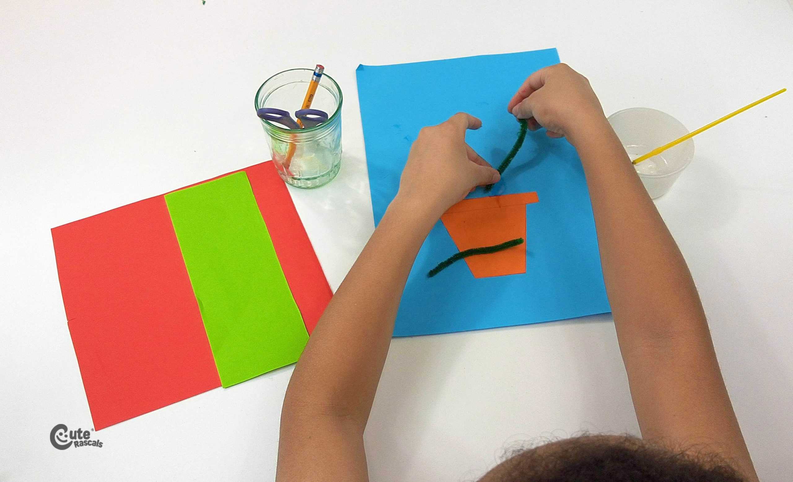 Paste the pipe-cleaners. Mother's Day crafts for kindergarten